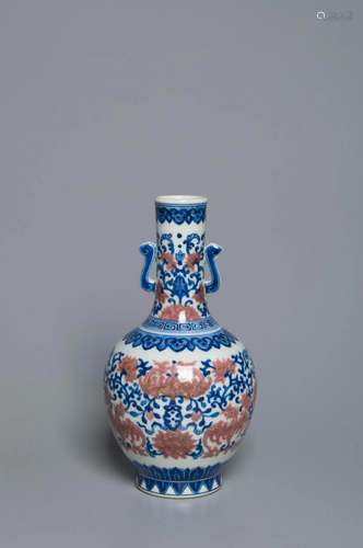 A BLUE AND WHITE AND UNDERGLAZE-RED VASE QING DYNASTY, JIAQI...