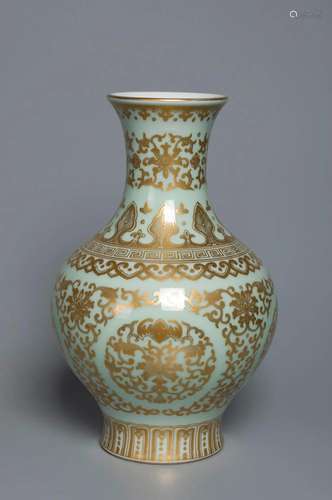 A GILT-DECORATED AND DECORATED GREENISH-GLAZED VASE QING DYN...