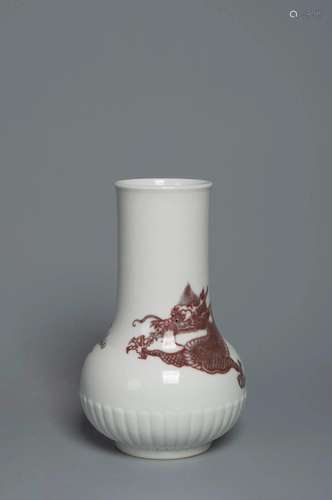 A WHITE GLAZE AND UNDERGLAZE-RED â€œDRAGONâ€ VASE QING DYNAS...