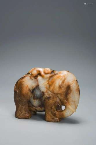 A WHITE AND RUSSET JADE ELEPHENT AND MONKEY MING DYNASTY