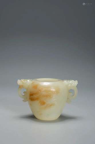 A WHITE AND RUSSET JADE LION EAR DEEP POT MING DYNASTY