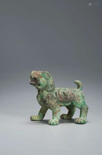 A BRONZE BUDDHIST LION TANG DYNASTY