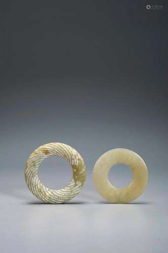 A PAIR OFJADE RINGS HAN DYNASTY