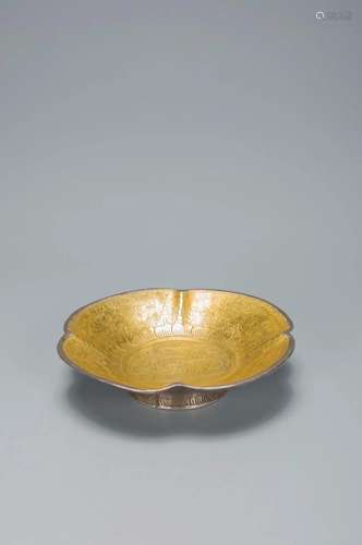 A PARCAL-GILT SILVER CARVED â€œDROGANâ€ DISH JIN DYNASTY