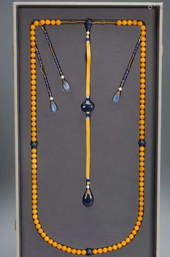 A BEESWAX AND SAPPHIRE AND LAPIS LAZULI COURT BEADS QING DYN...