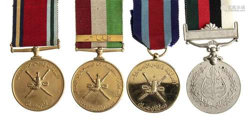 OMAN LOT OF FOUR MEDALS OF MERIT OF SERVICE GOLDEN AND SILVE...