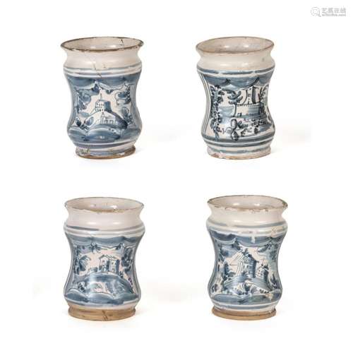 Group of four white and blue majolica albarelli