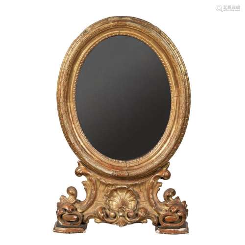 Mirror in gilded and carved wood