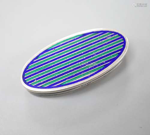 A George V silver and two colour enamel oval vinaigrette, Le...