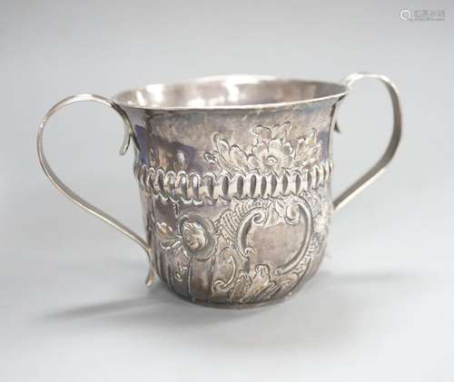 A George III embossed silver porringer, FM, London, 1766, 64...