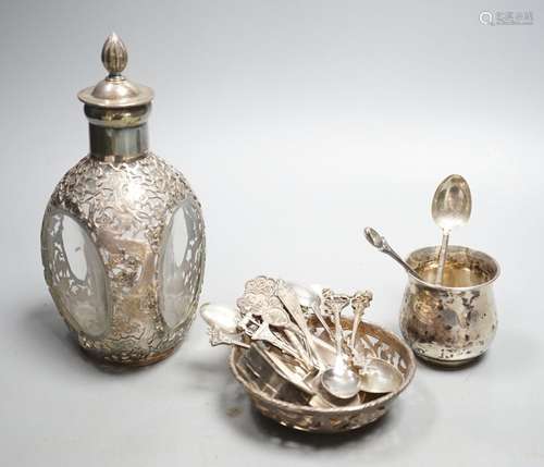 A Chinese white metal overlaid glass dimpled decanter and st...