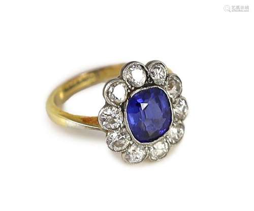 An 18ct gold and platinum, synthetic sapphire and diamond se...