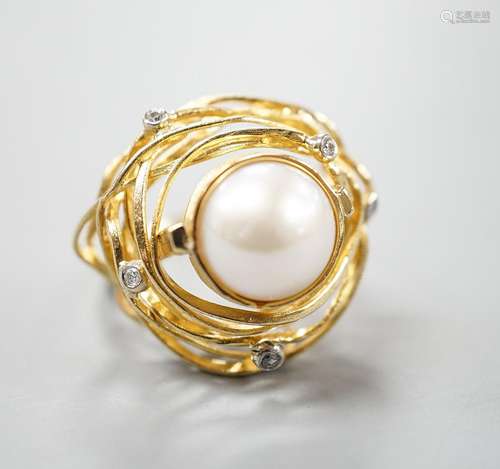 A modern 750 yellow metal, mabe pearl and diamond chip set m...