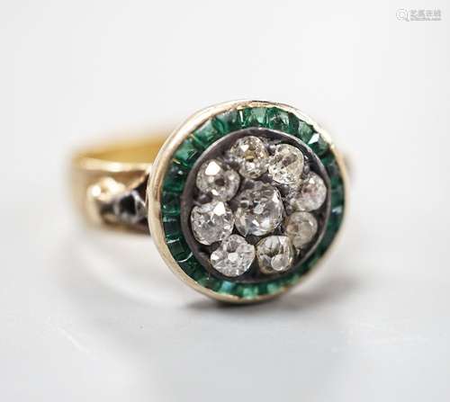 A George V 22ct gold emerald? and diamond set circular clust...