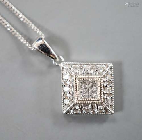 A modern 9k and diamond chip set pendant, 10mm, on a 585 fin...