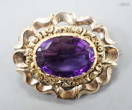 A yellow metal and amethyst set brooch, 29mm, gross 5.7 gram...