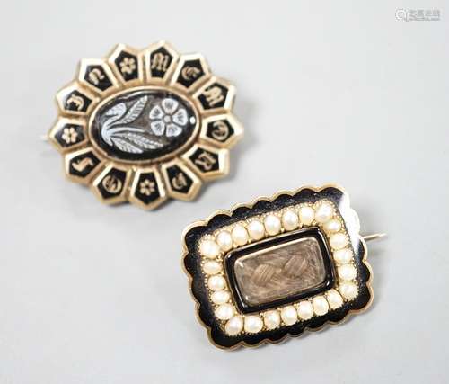 Two 19th century yellwo metal mourning brooches, one with pl...