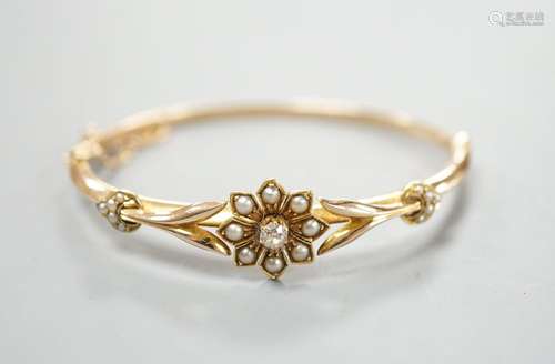 An early 20th century yellow meta diamond and seed pearl set...