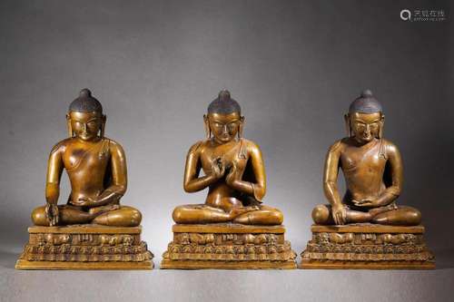 Three Gilt Bronze Figures of Buddha