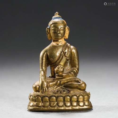 A Bronze-gilt Seated Medicine Buddha