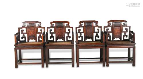 A Set of Four Hardwood Chairs