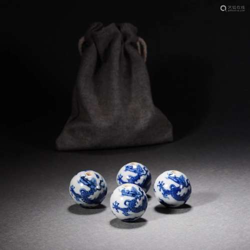 A Group of Four Blue and White Finials