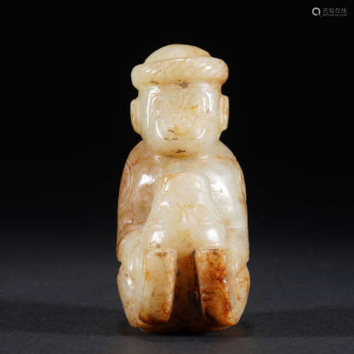A CHINESE JADE FIGURE