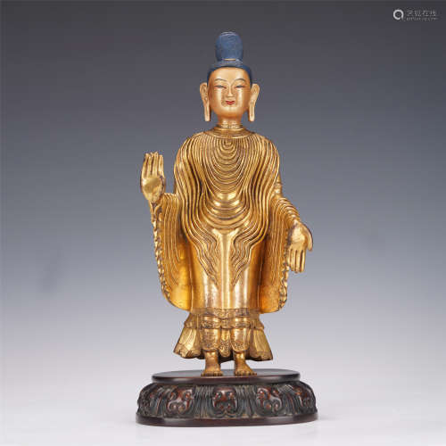 A CHINESE FIGURE OF BUDDHA STANDING STATUE