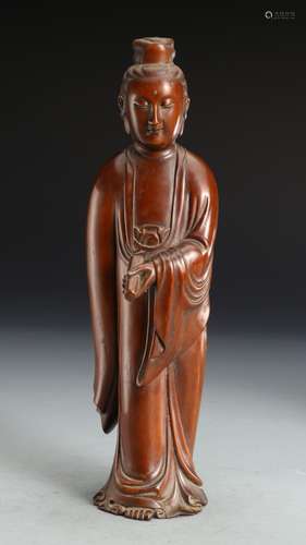 A HUANGYANG WOOD GUANYING STATUE