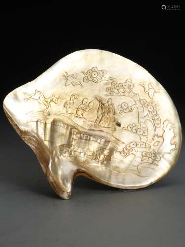 A carved Tridacna ornaments