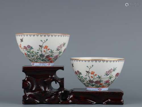 A DAOGUANG DYNASTY YONGZETANG ZHI PAIR OF FAMILLE ROSE CUPS