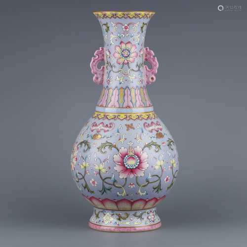 A QIANLONG FAMILLE ROSE YELLOW-GROUND ‘BOYS’ TWIN-HANDLED VA...