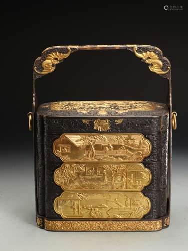 A   GILT STORY OVER HANDLE BOX