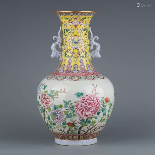 A  QIANLONG YELLOW GROUND FAMILLE ROSE DOUBLE EAR VASE