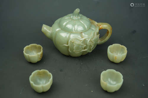 A SET OF  JADE TEAPOT AND FOUR TEACUPS