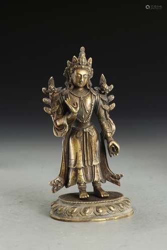 A  COPPER GUANYIN STATUE