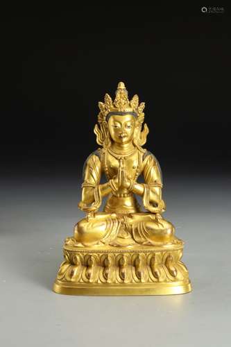 A  GILT-BRONZE SITTING BUDDA STATUE