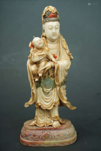 A FURONG STONE GUANYIN STATUE