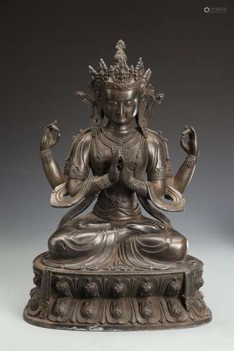 A  BRONZE GUANYIN FIGURE