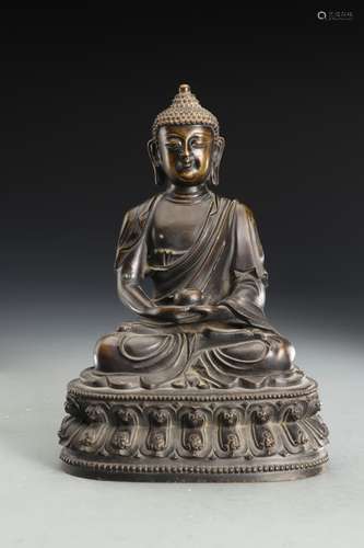 A  SEATTED FIGURE OF BUDDHA SHAKYAMUNI