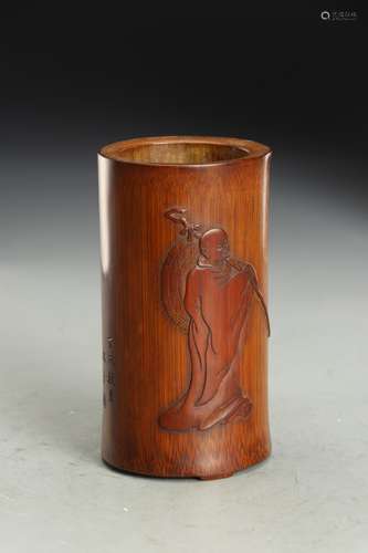 A CARVED BAMBOO LUOHAN BRUSH POT