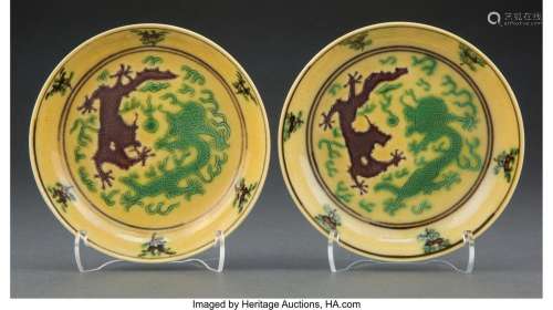 A Pair of Chinese Green and Aubergine Decorated Yellow Glaze...