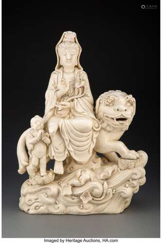 A Chinese Blanc-de-Chine Figure of Guanyin Seated on a Lion ...