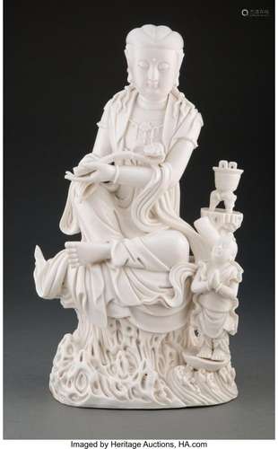 A Chinese Blanc-de-Chine Figure of Guanyin with Acolyte Mark...