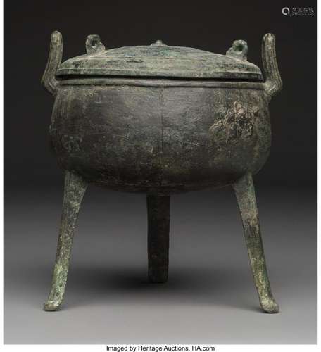 A Chinese Bronze Tripod Vessel and Cover, Han Dynasty 12-1/8...