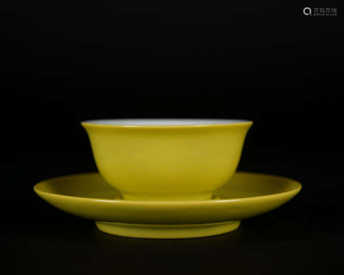 A yellow glazed teacup