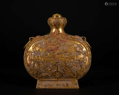 A gold inlaid vase