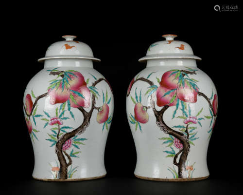 A pair of famille-rose 'peach' jar and cover