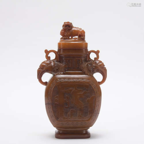 A Shou shan stone vase and cover