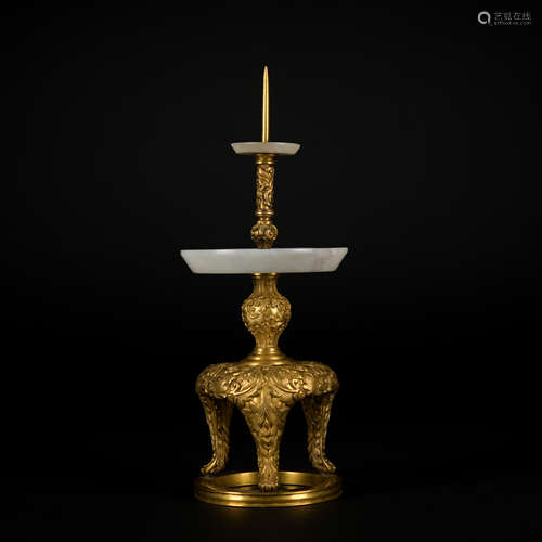 A gilt-bronze candlestick